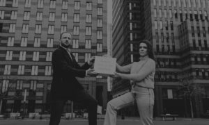 Aniek Moonen, Chair of the Dutch Youth Climate Movement, handing empty briefcase with Natural Capital to the Minister of New Economy Michel Scholte